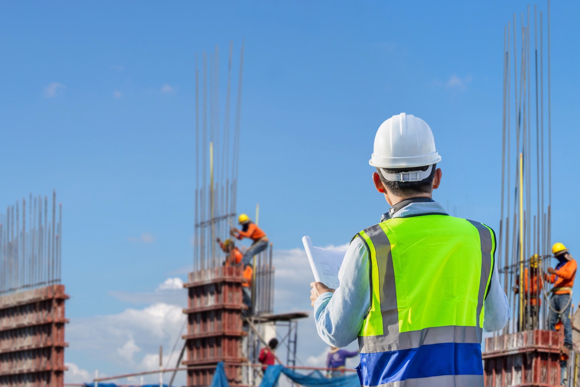 Engineer reviewing project plans